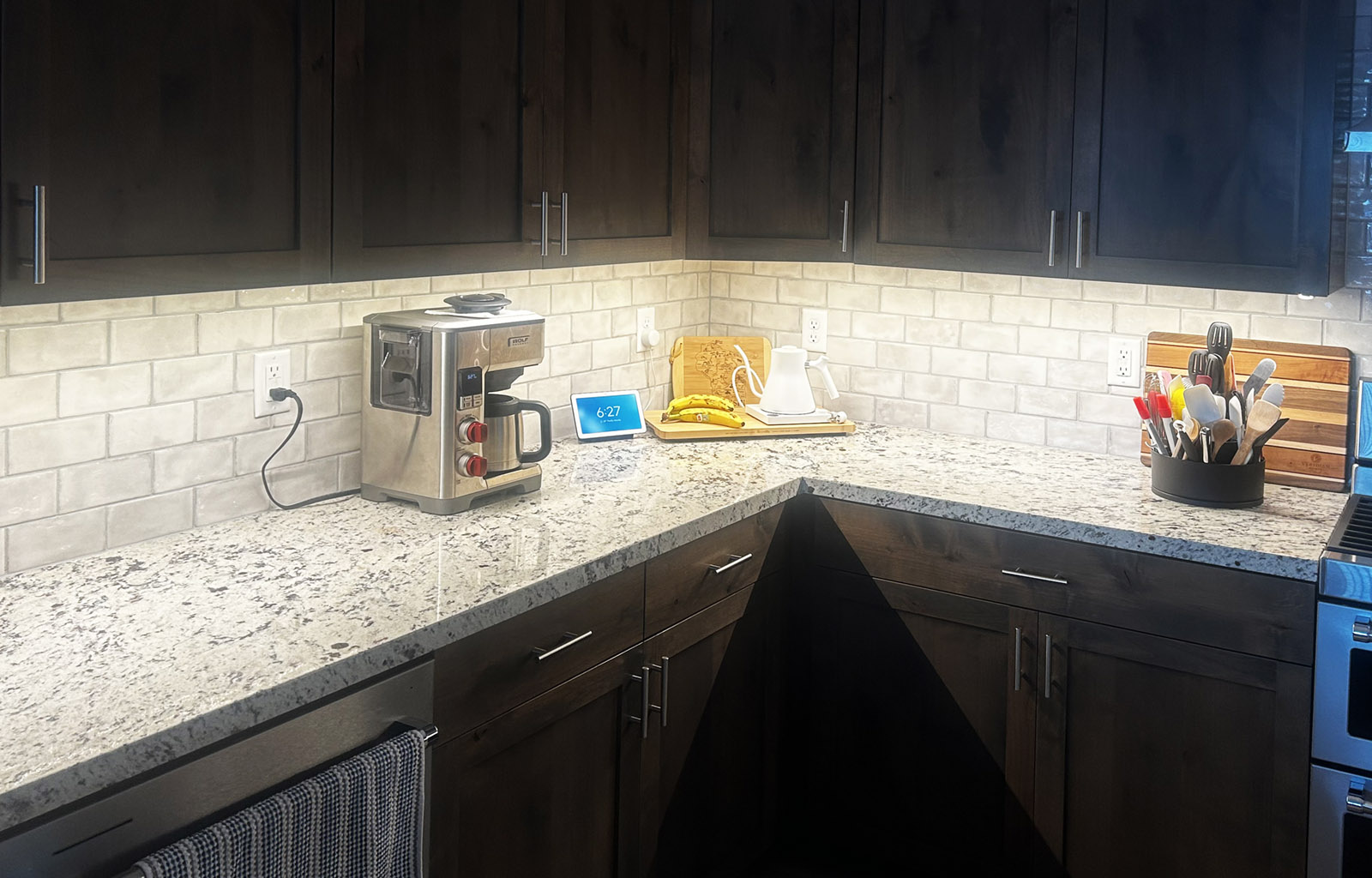 Under Cabinet LEDs Under cabinet LED lights illuminating the countertop area